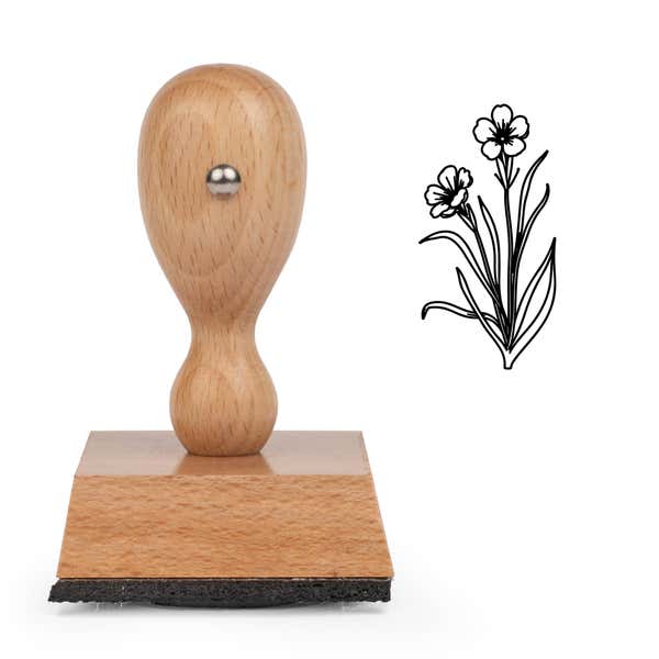 Grassy Wildflower Bunch Craft Stamp standing upright beside its black stamped grassy wildflower bunch image
