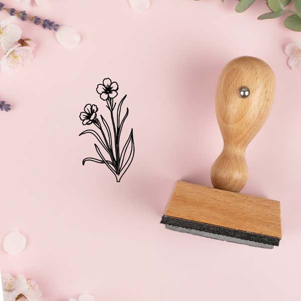 Grassy wildflower bunch stamped in black on pink cardstock with lavender sprigs and blossoms
