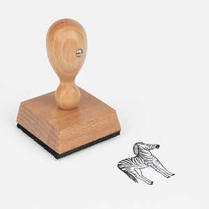 Safari Zebra Craft Stamp at an angle with its wooden handle and block