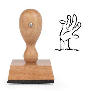 Undead Zombie Hand Craft Stamp standing upright beside its black stamped zombie hand image