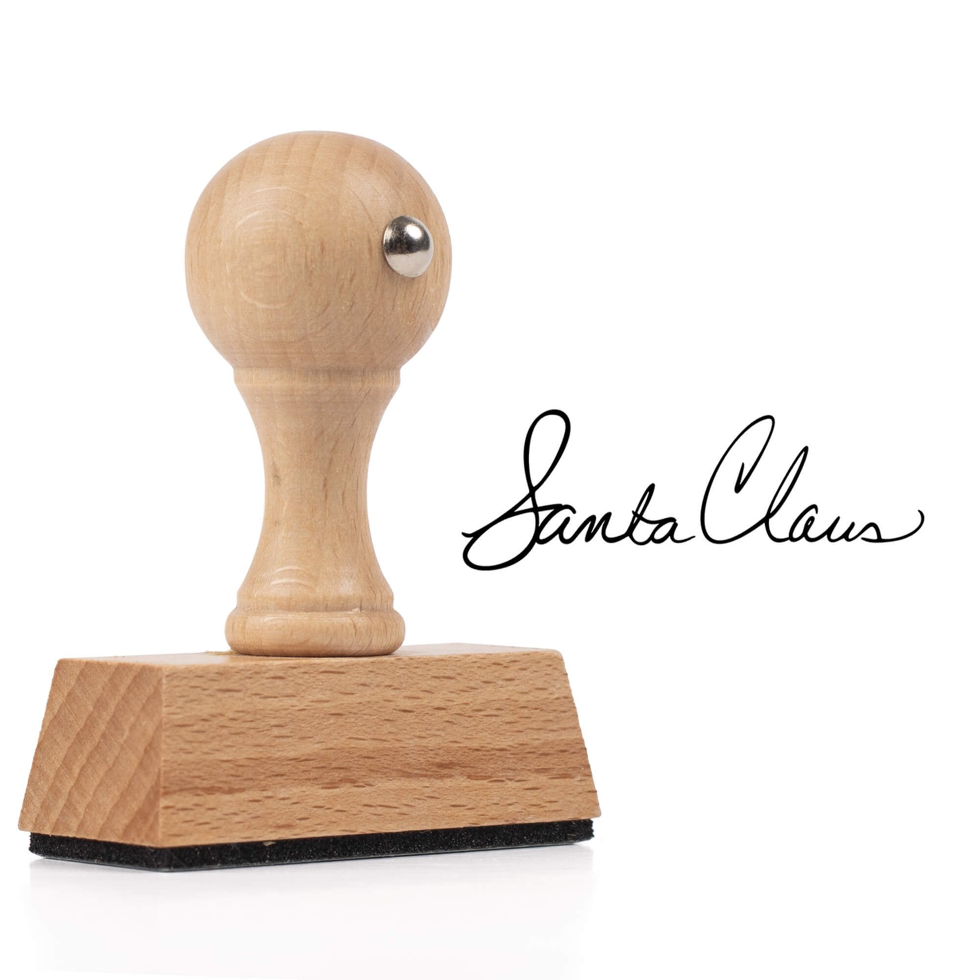 Santa Claus signature European hand stamp shown beside wooden stamp body on clean white background.