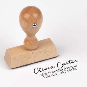 Relaxed Script Custom Address Stamp impression next to European stamp body