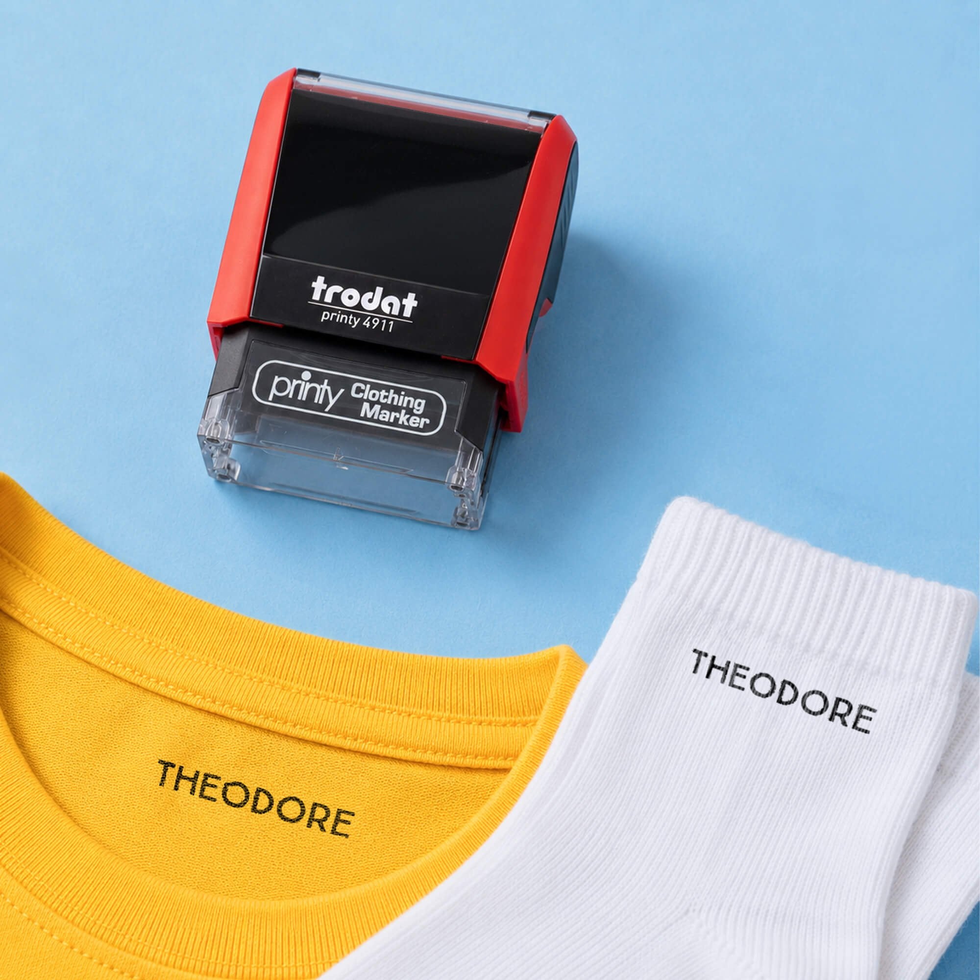 Example of the Trodat 4911 Clothing Name Stamp on Various Clothing Pieces