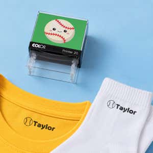 Baseball clothing name stamp with a yellow shirt and white socks labeled Taylor