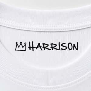 Crown name stamp reading Harrison inside the collar of a white shirt