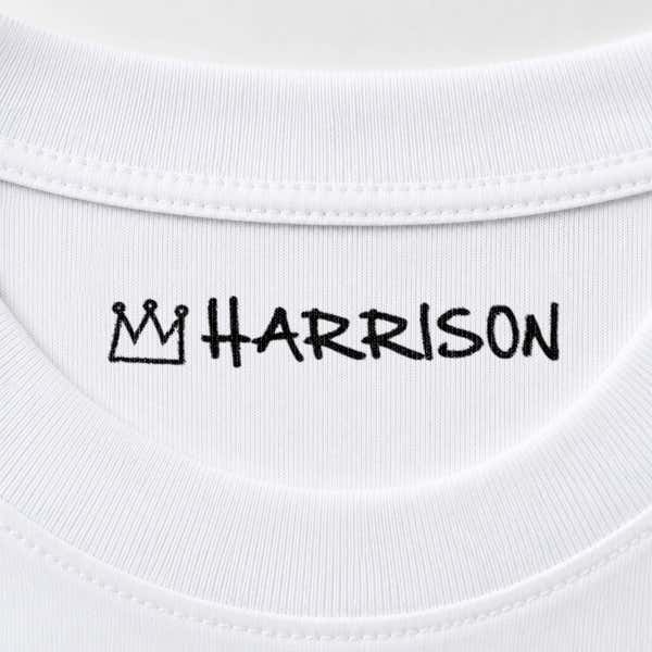 Crown name stamp reading Harrison inside the collar of a white shirt
