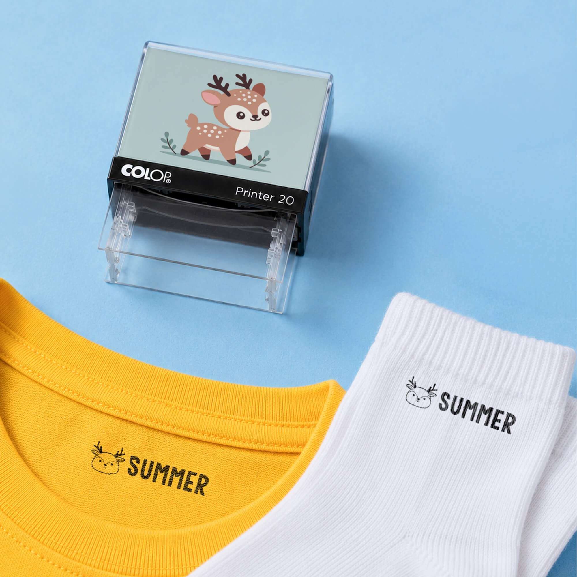 Deer clothing name stamp with a yellow shirt and white socks labeled Summer