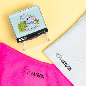 Elephant clothing name stamp beside pink and light gray shirts labeled Jayson