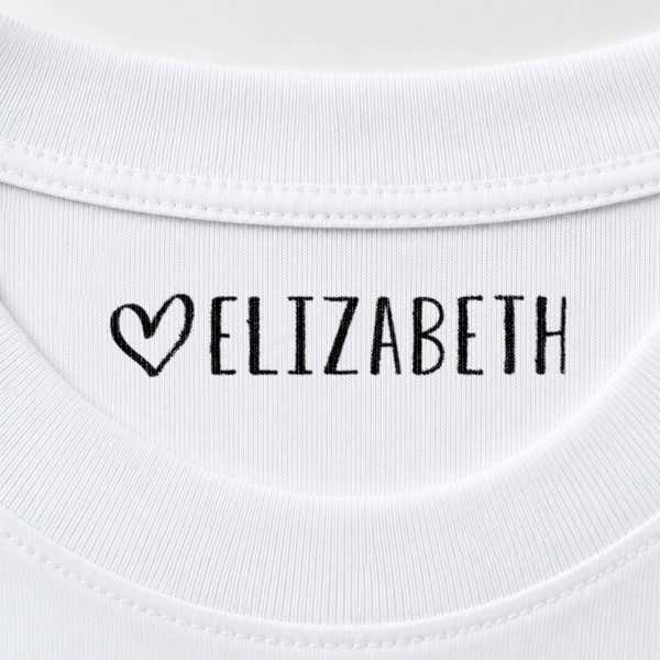 Heart name stamp reading Elizabeth inside the collar of a white shirt