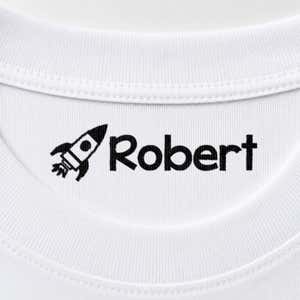 Rocket name stamp reading Robert inside the collar of a white shirt