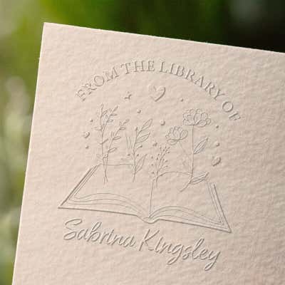 Book embosser impression stamp on paper