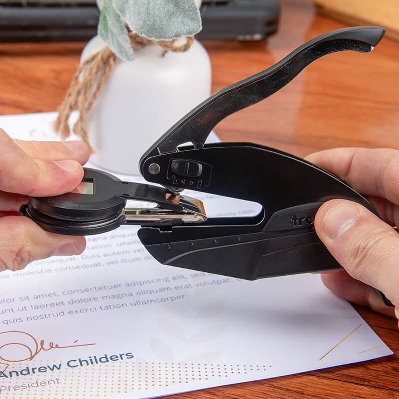 Embosser being assembled