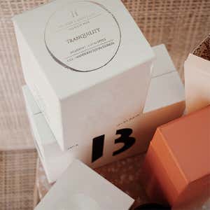  3" x 3"  Stamp impression on a White box. 
