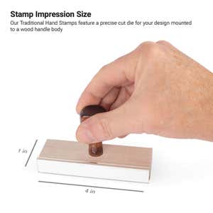 Custom wooden rubber stamp 1" x 4" impression size demonstration with hand stamp