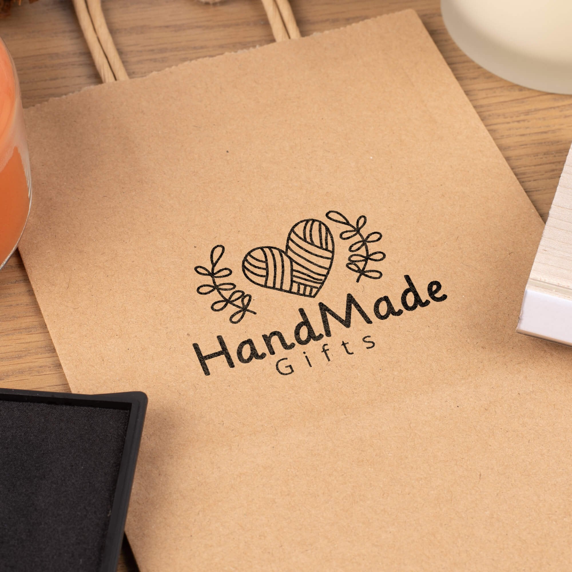 Stamp impression on a bag as branding for a small business Stamp impression on a bag as branding for a small business