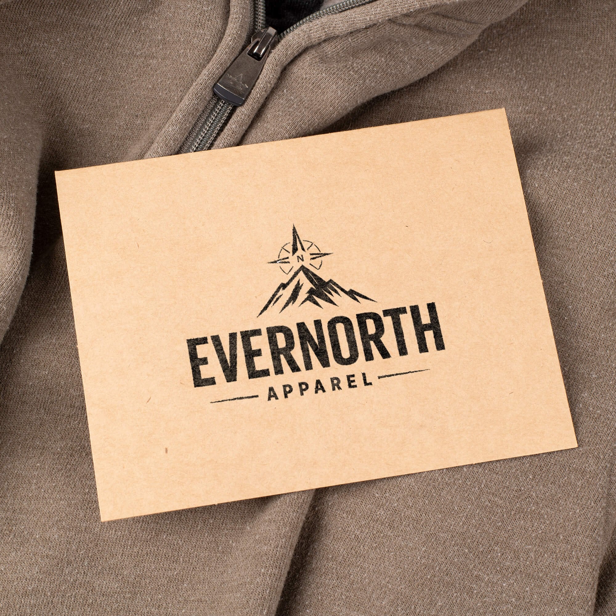 Custom branding stamp printed on a kraft hang tag for an apparel business logo. Custom branding stamp printed on a kraft hang tag for an apparel business logo.