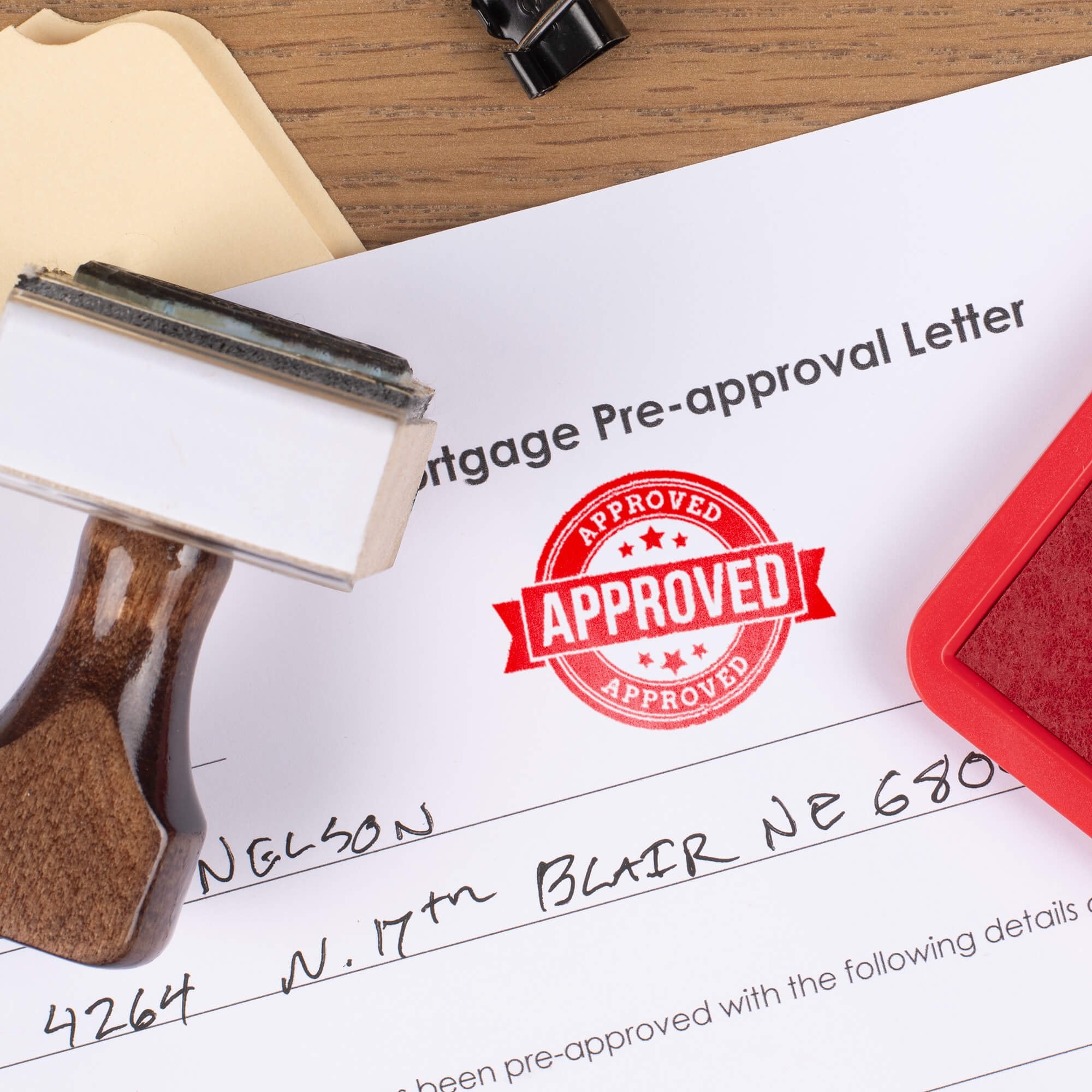 Approved custom stamp in red ink. Approved custom stamp in red ink.