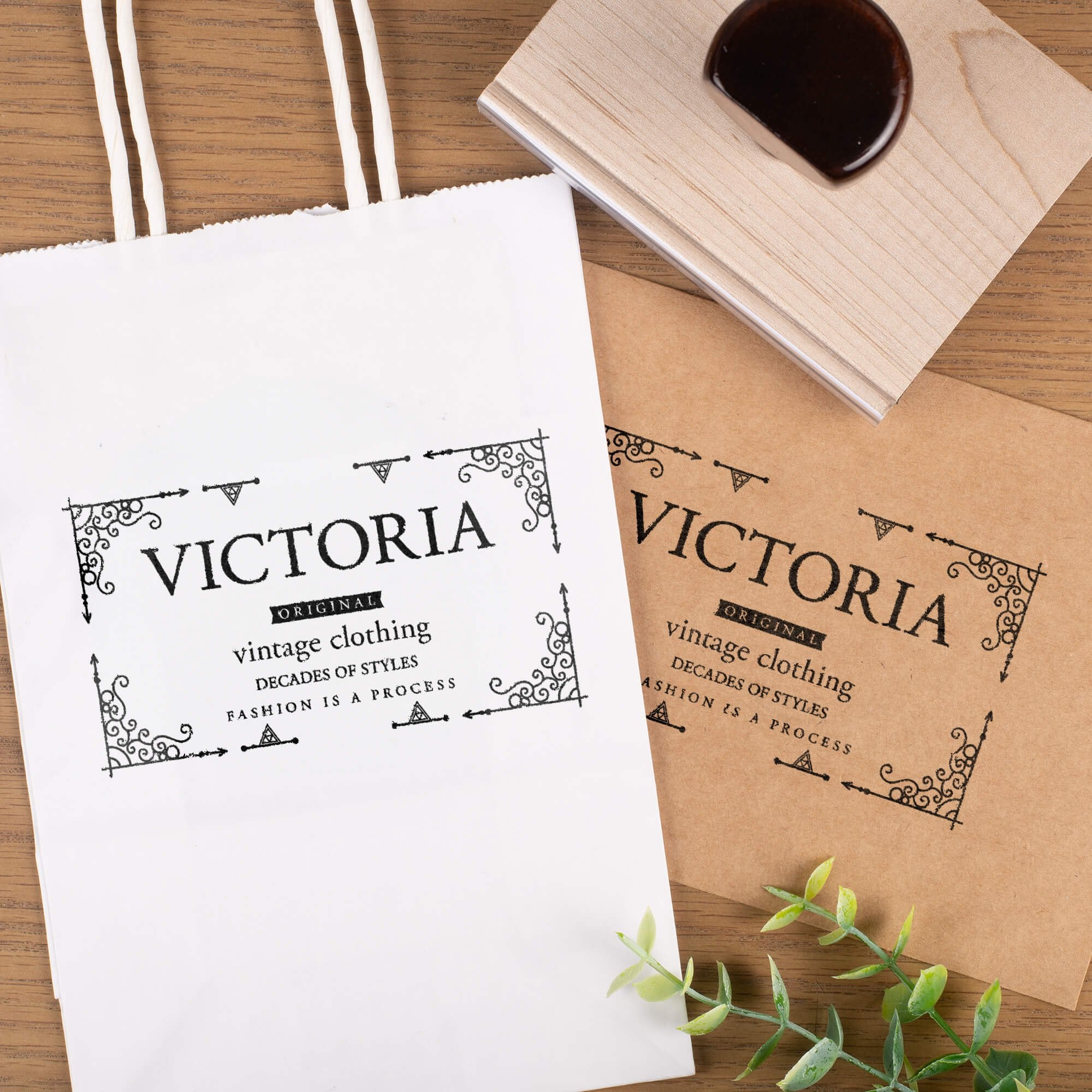 Wooden rubber stamp imprinting business logo on paper bags Wooden rubber stamp imprinting business logo on paper bags