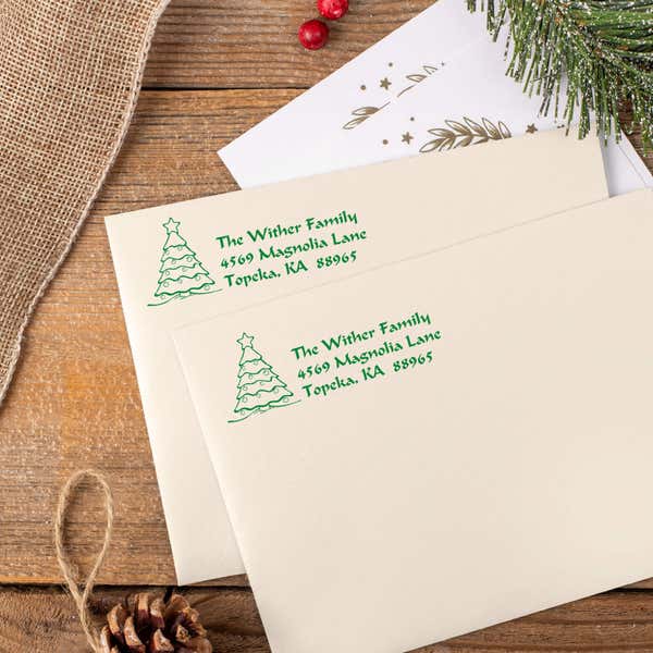 Green ink impressions of ‘Christmas Tree Custom’ return address stamp on Christmas envelopes.