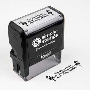 Top angle view of self-inking holiday stamp with circular ‘Bold Candy Canes’ address design.