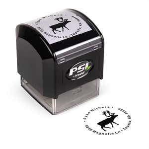 Pre-inked stamp shown from above featuring custom ‘Holiday Reindeer’  holiday return address design.