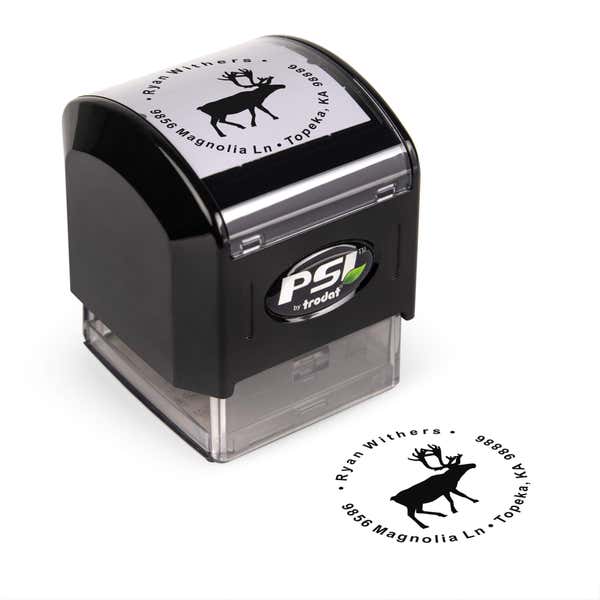 Pre-inked stamp shown from above featuring custom ‘Holiday Reindeer’  holiday return address design.