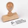 European wood hand stamp shown from above featuring custom ‘Sketch Snowman’ holiday return address design.