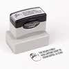 Pre-inked stamp shown from above featuring custom ‘Sketch Snowman’  holiday return address design.