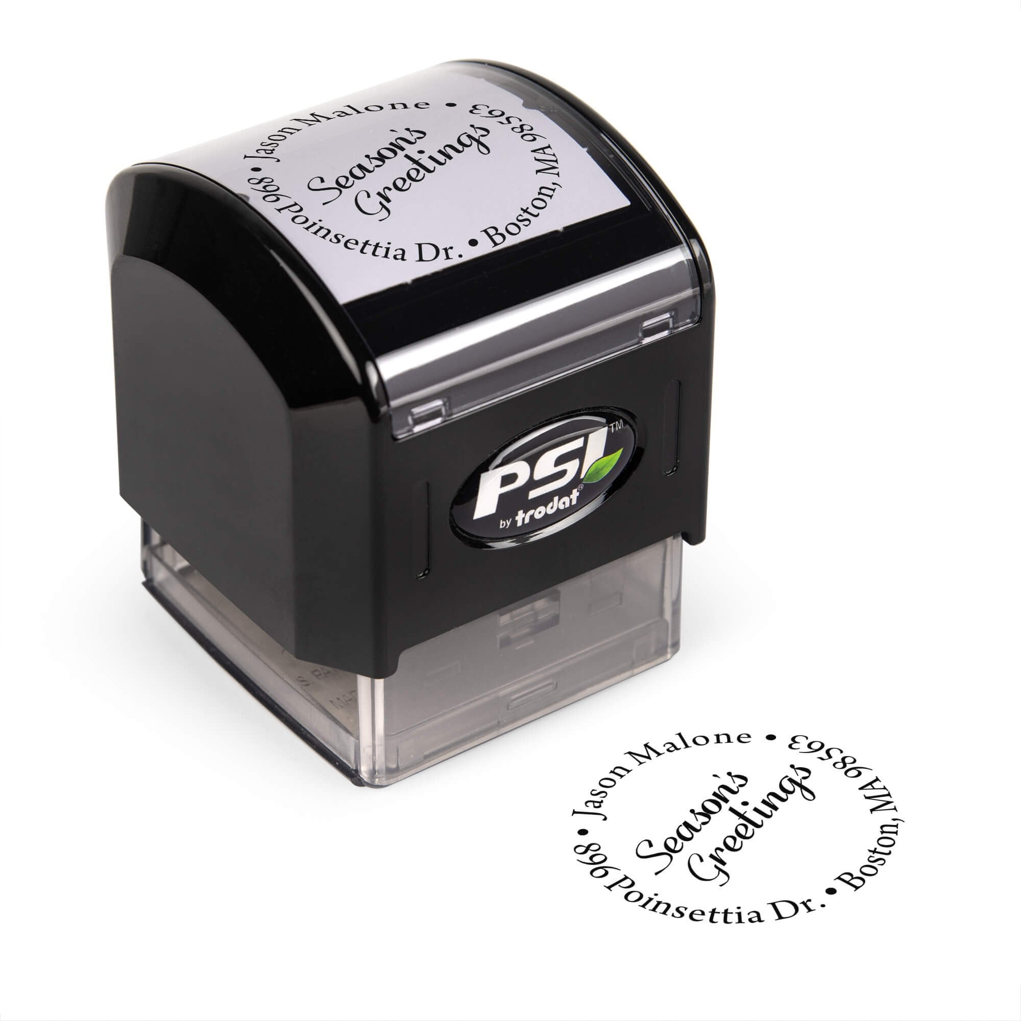 Pre-inked stamp shown from above featuring custom ‘Season’s Greetings Holiday’  holiday return address design.