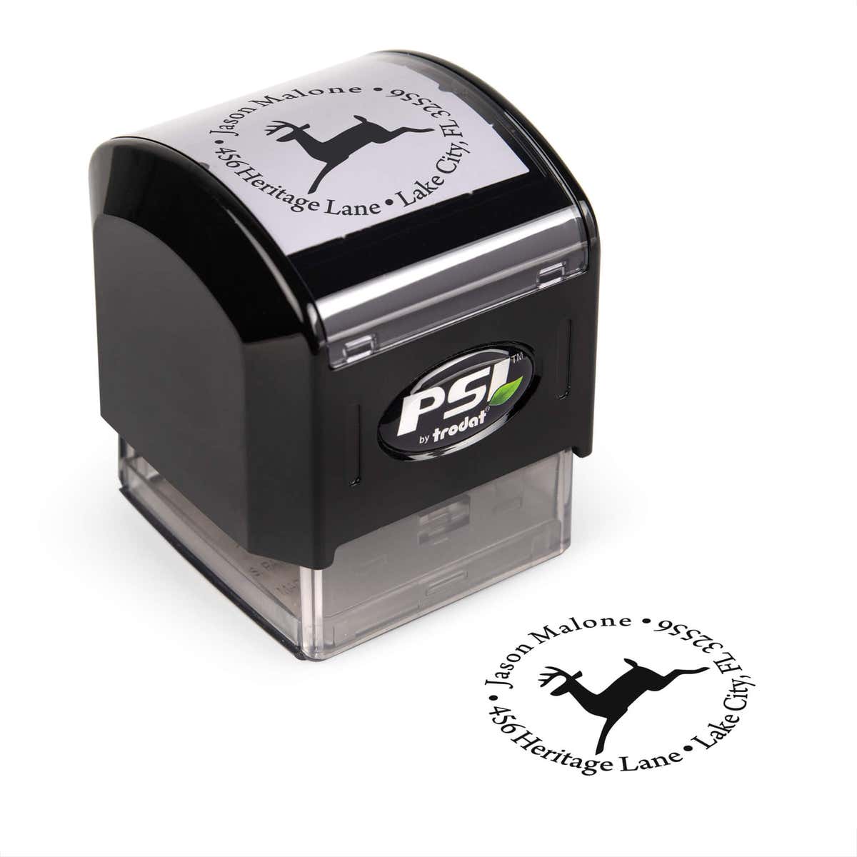 Pre-inked stamp shown from above featuring custom ‘Leaping Reindeer Holiday’  holiday return address design.