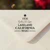 Personalized ‘Display Christmas Tree’ address stamp impression on envelope flap for holiday cards.