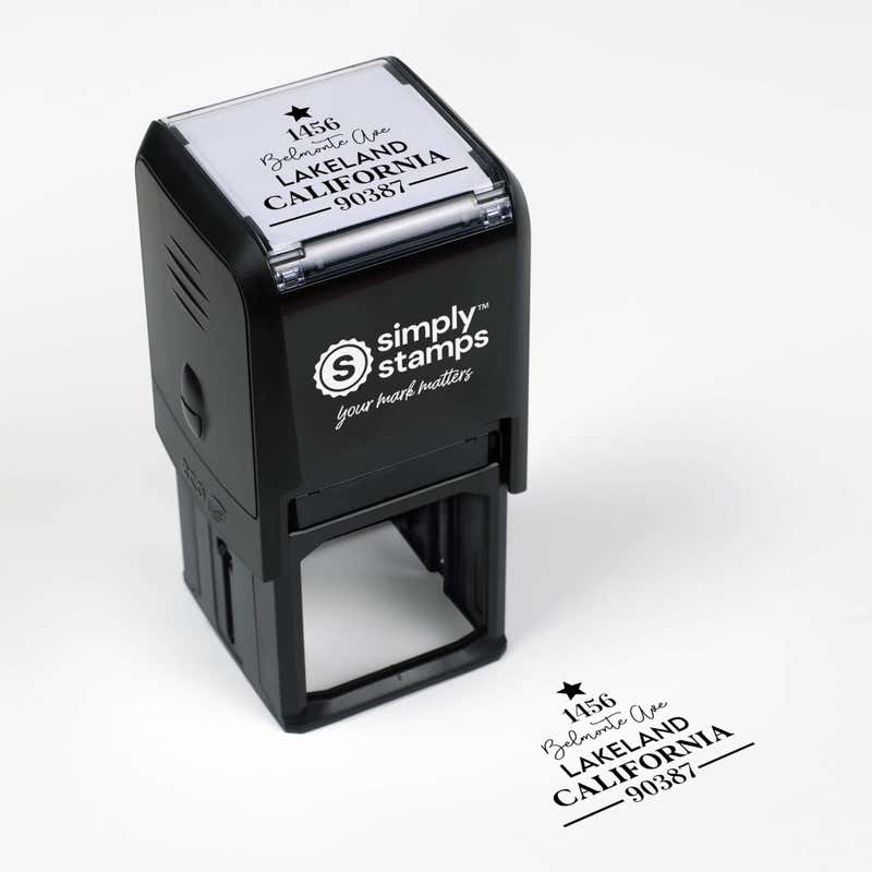 Top angle view of self-inking holiday stamp with ‘Display Christmas Tree’ address design.