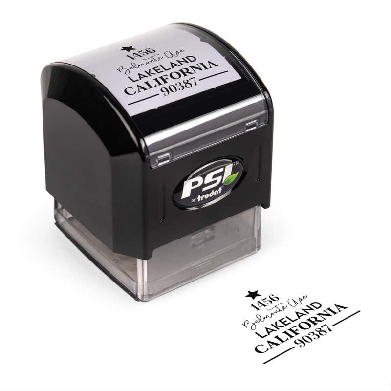 Pre-inked stamp shown from above featuring custom ‘Display Christmas Tree’  holiday return address design.