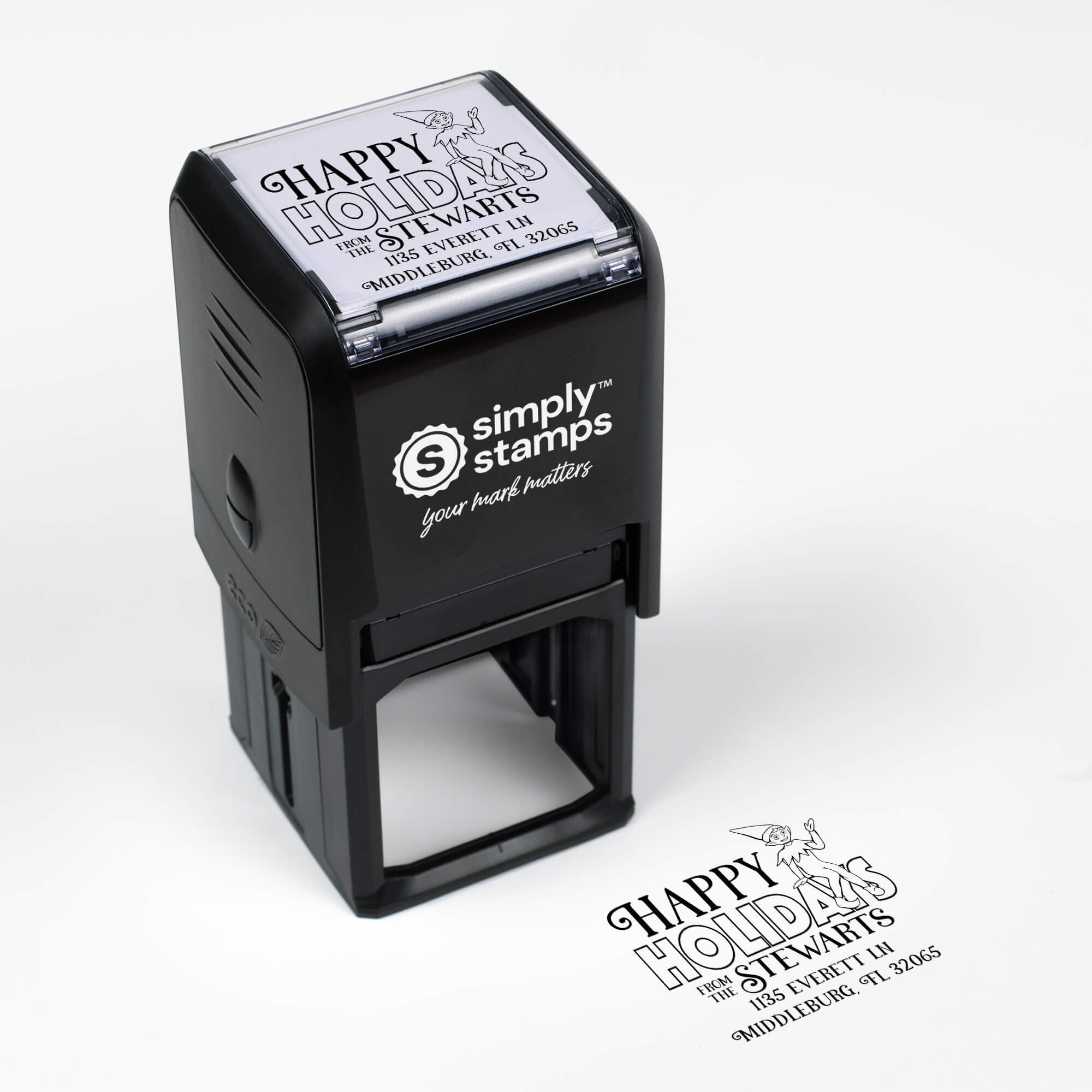 Top angle view of self-inking holiday stamp with ‘Cartoon Elf’ address design.