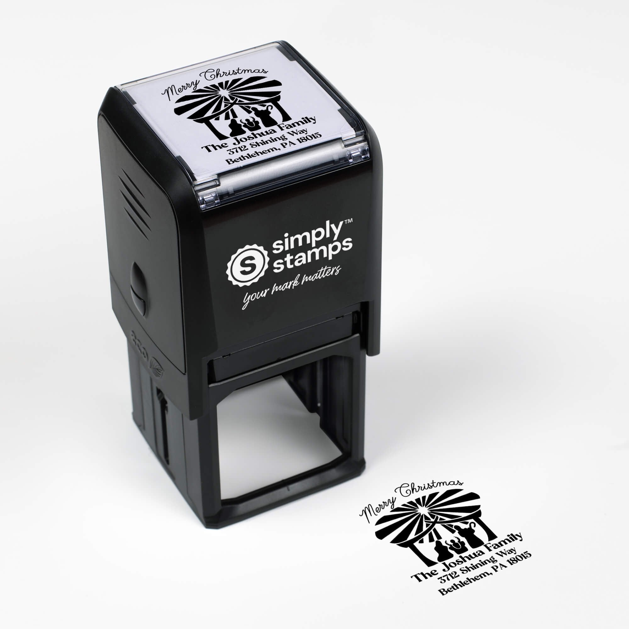 Top angle view of self-inking holiday stamp with ‘Nativity Scene’ address design.