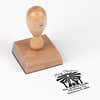 European wood hand stamp shown from above featuring custom ‘Nativity Scene’ holiday return address design.