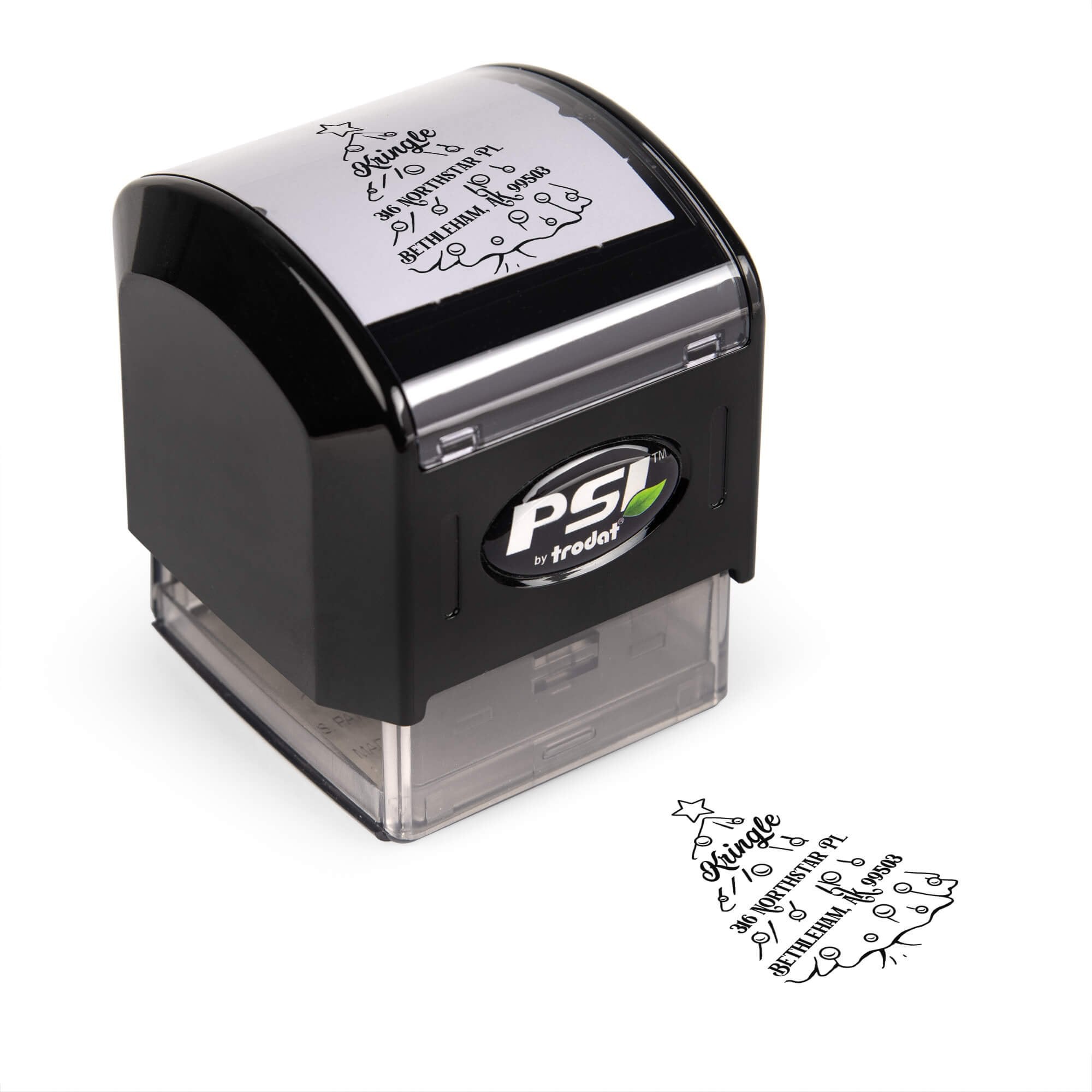 Pre-inked stamp shown from above featuring custom ‘Cartoon Christmas Tree’  holiday return address design.