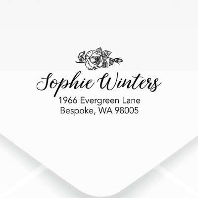 Floral Script Return Address Stamp on an envelope 
