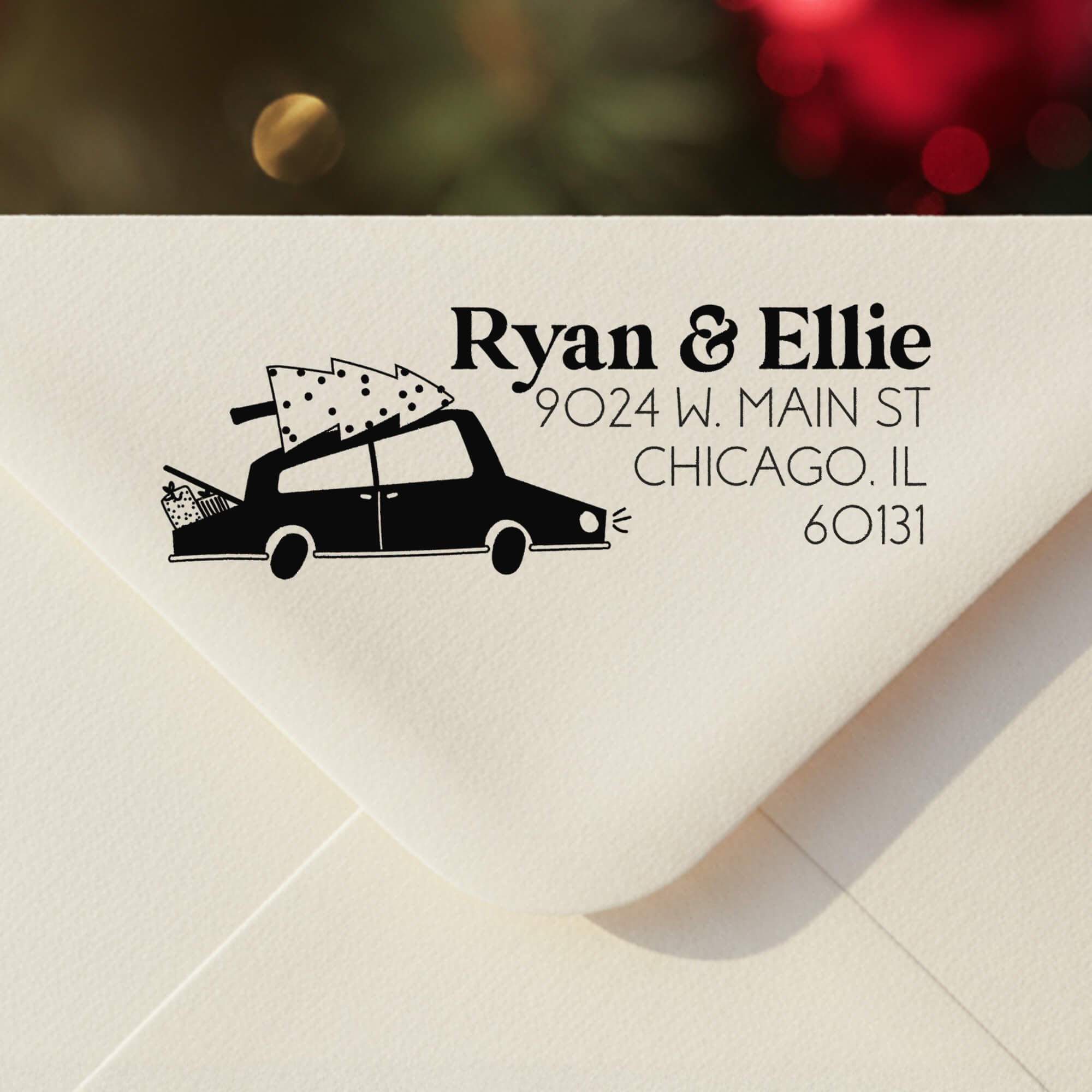 Personalized ‘Christmas Car’ address stamp impression on envelope flap for holiday cards.