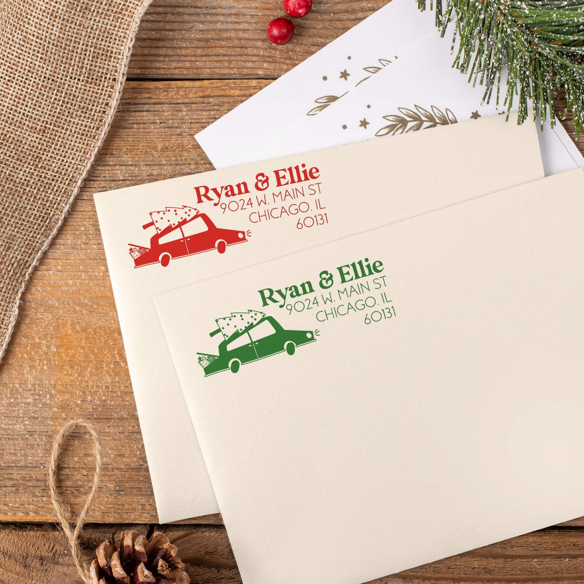Green and red ink impressions of ‘Christmas Car’ return address stamp on Christmas envelopes.