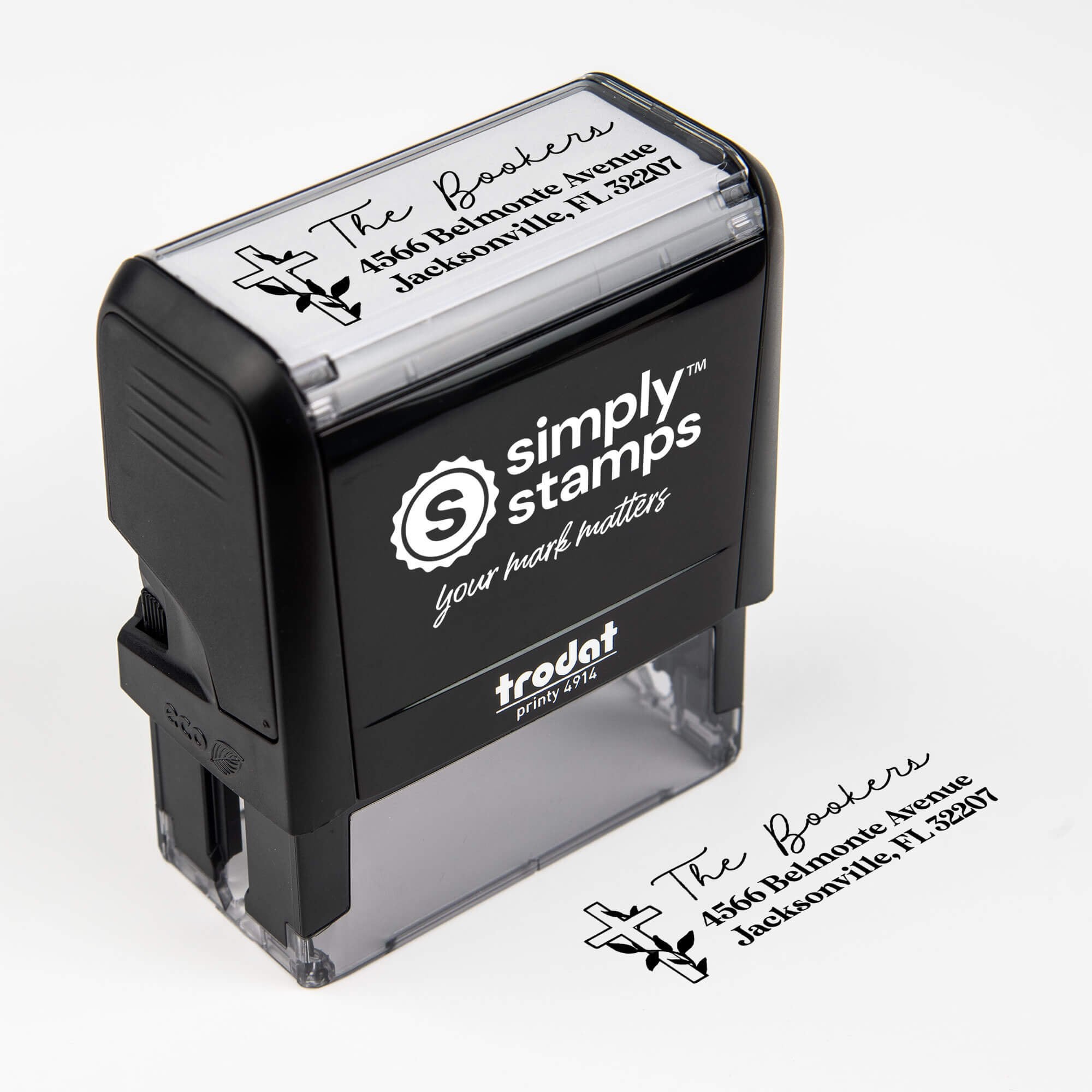 Top angle view of self-inking holiday stamp with circular ‘Religious Cross Christmas’ address design.