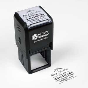 Top angle view of self-inking holiday stamp with circular ‘Merry Christmas’ address design.