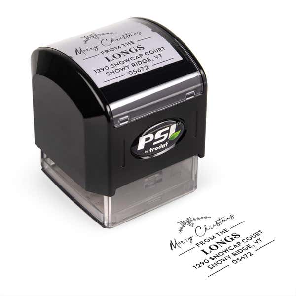 Pre-inked stamp shown from above featuring custom ‘Merry Christmas’  holiday return address design.