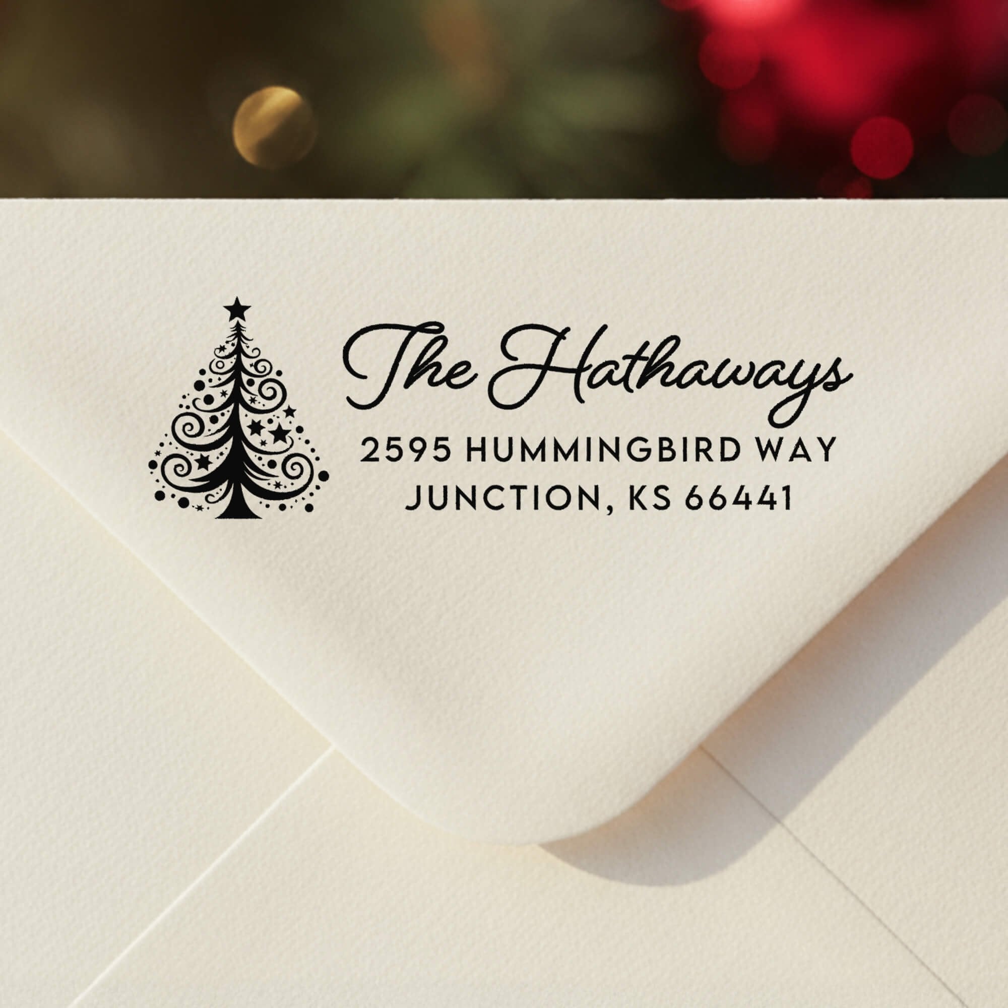 Personalized ‘Christmas Tree’ address stamp impression on envelope flap for holiday cards.