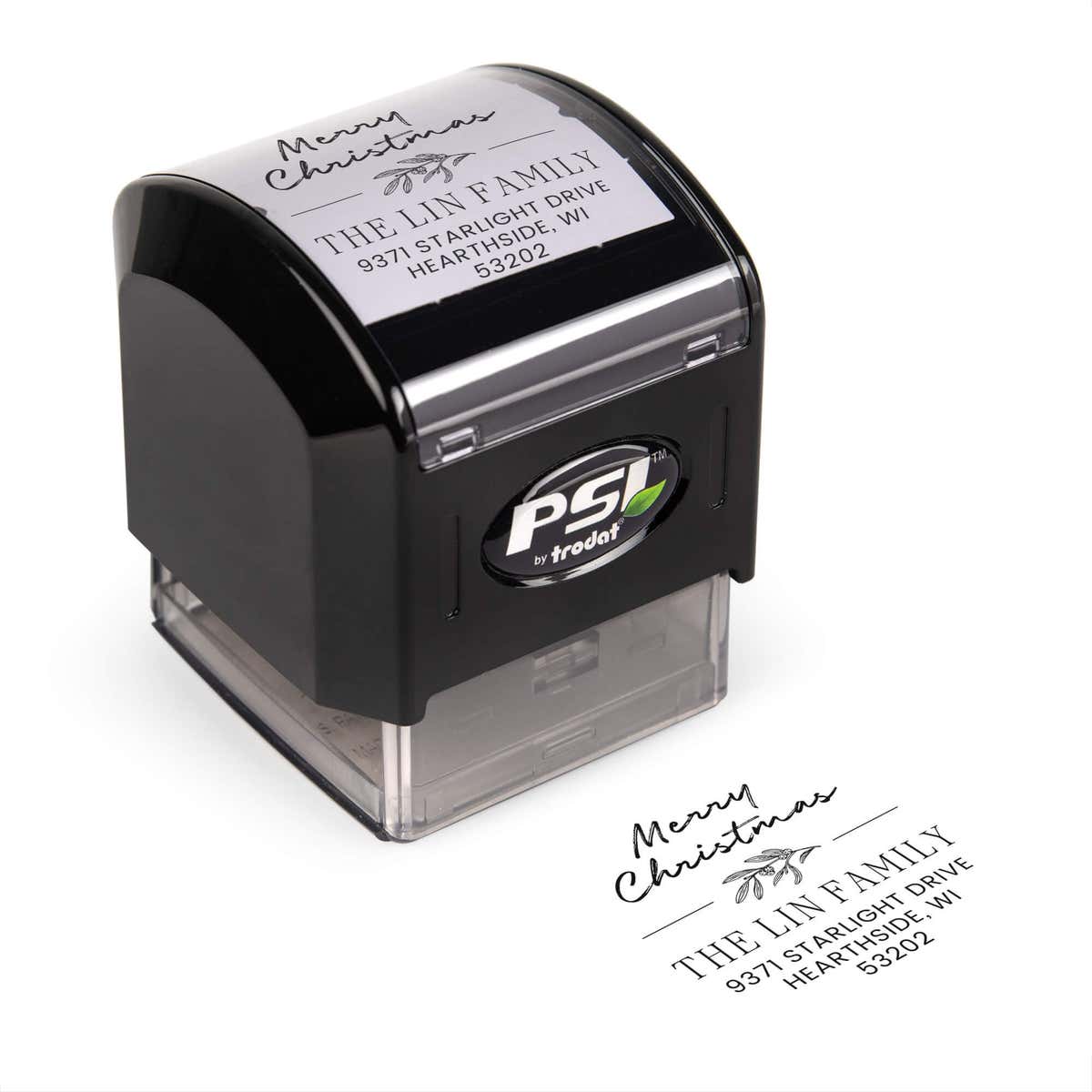 Pre-inked stamp shown from above featuring custom ‘Magnolia Merry Christmas’  holiday return address design.