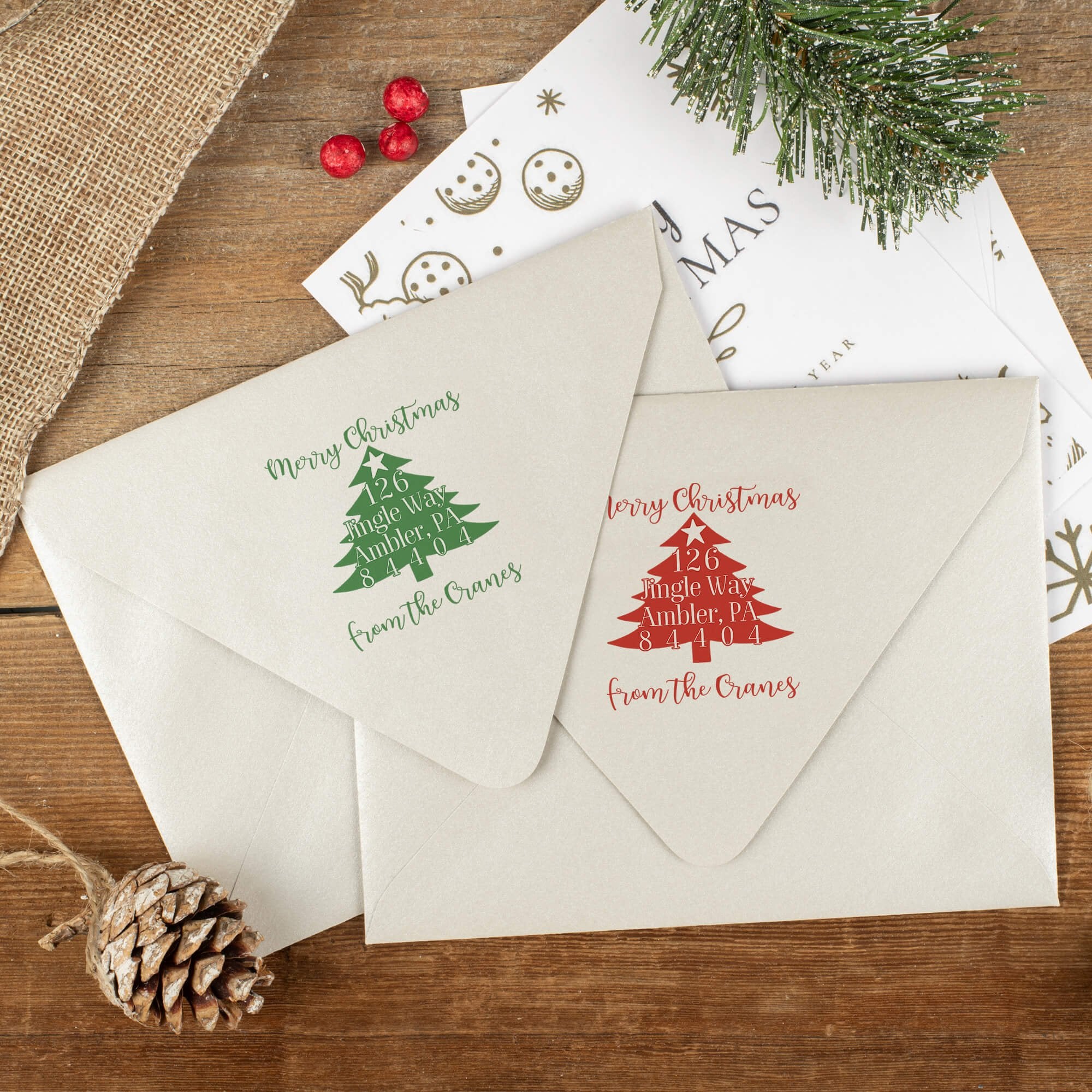 Green and red ink impressions of ‘Christmas Tree’ return address stamp on Christmas envelopes.