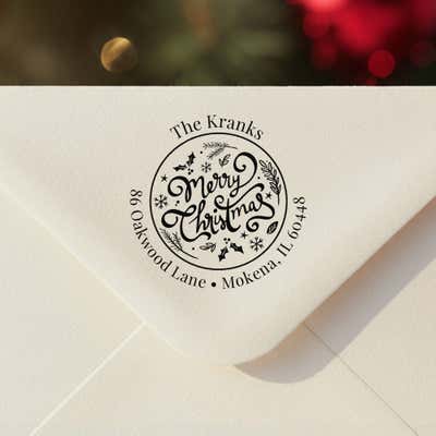 Personalized ‘Merry Christmas Script’ address stamp impression on envelope flap for holiday cards.