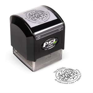 Pre-inked stamp shown from above featuring custom ‘Merry Christmas Script’ holiday return address design.