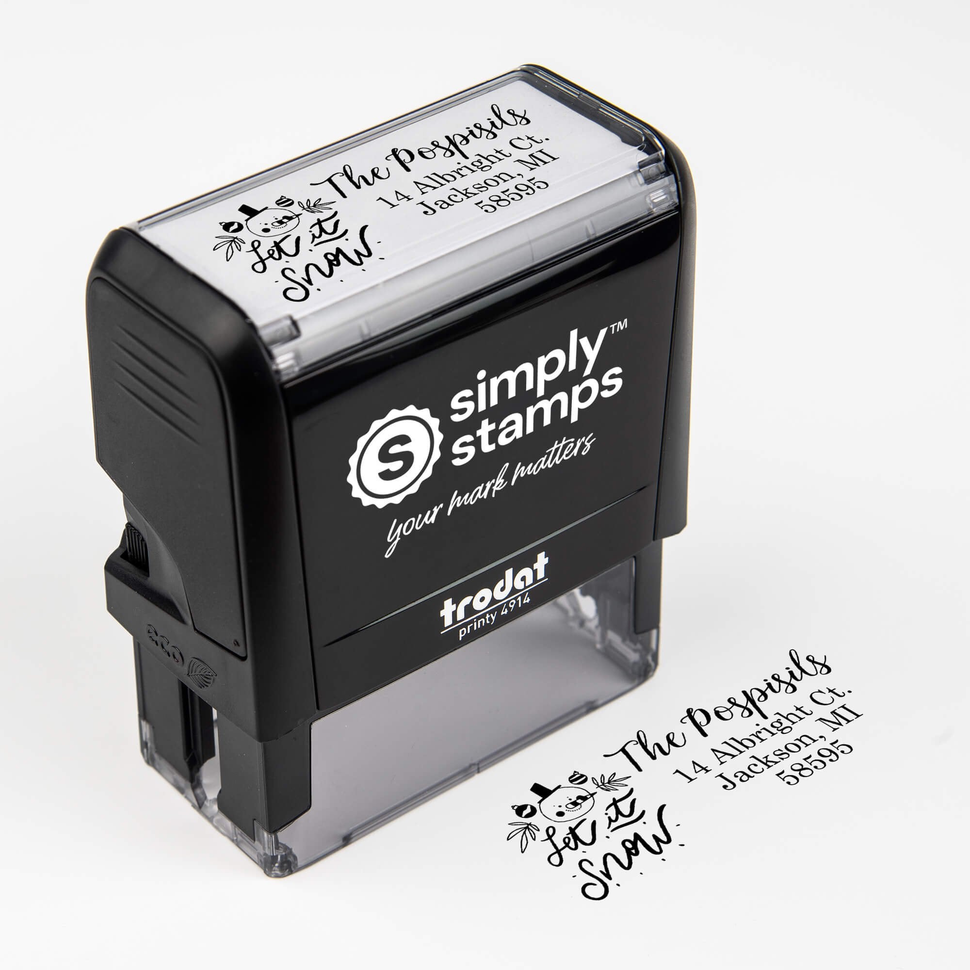 Top angle view of self-inking holiday stamp with ‘Let It Snow Winter Snowman’ address design.