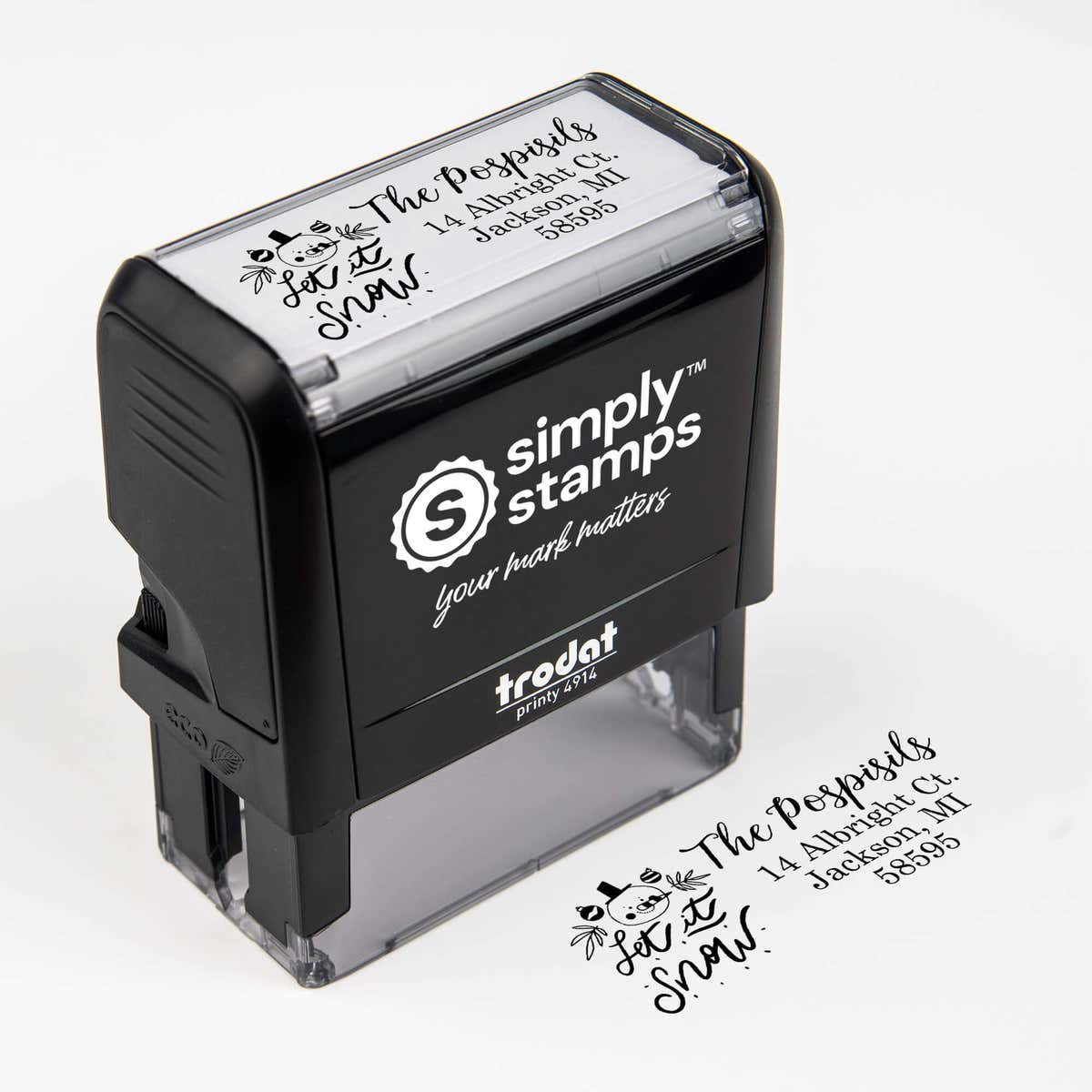 Top angle view of self-inking holiday stamp with ‘Let It Snow Winter Snowman’ address design.